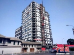 北京一处正在建设的楼房。中新网记者 李金磊 摄 - 供销合作总社