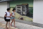 小伙街头手绘郑州地标建筑 那些年的老郑州你认出了哪? - 河南一百度