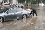 这场狂风暴雨让郑州高新区主干道成了大水塘 - 河南一百度