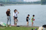 “郑州小三亚”上线：可玩沙可戏水，北龙湖成夏日遛娃“圣地” - 河南一百度