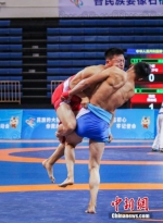 全国少数民族传统体育运动会：民族式摔跤 - 中国新闻社河南分社