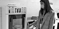记者探访恢复开放的郑州图书馆 自助消毒柜几十秒就能给图书消毒 - 河南一百度