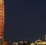 6月22日晚间，河南省会郑州市地标建筑千禧广场“玉米楼”上演灯光秀，美轮美奂。中新社记者 刘鹏 摄 - 中国新闻社河南分社