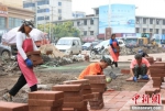 郑州灾后重建见闻：“失联孤岛”复通行 “网红石榴”迎中秋 - 中国新闻社河南分社