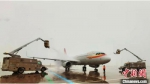 雪袭中原 郑州机场执行航班490架次 - 中国新闻社河南分社