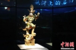 　馆藏的“天王踩小鬼”陶俑。程航 摄 - 中国新闻社河南分社