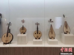 　图为展出的琵琶。刘鹏 摄 - 中国新闻社河南分社