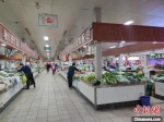 郑州城区某农贸市场，蔬菜供应量充足。　阚力 摄 - 中国新闻社河南分社