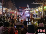 　图为河南安阳殷墟考古文旅小镇举办跨年夜活动。　麻翛然 摄 - 中国新闻社河南分社