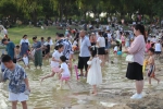 郑州北龙湖一处沙滩成市民的避暑胜地 - 河南一百度